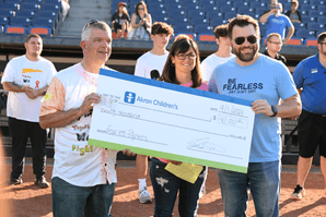 Man holding a big check