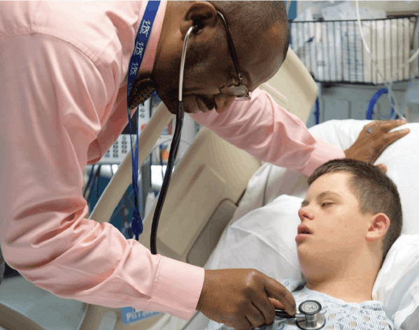 Dr. Forbes and patient- More Childhood Please Magazine