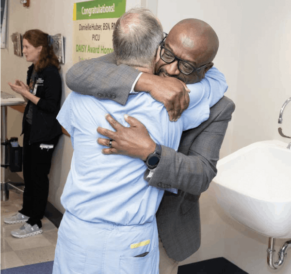 Dr. Forbes Hugging - More Childhood Please Magazine