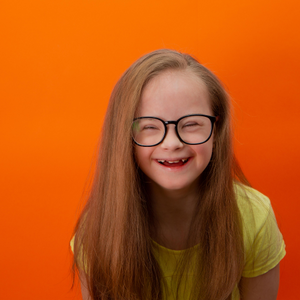 Featured Image for Girl with Down Syndrome wearing glasses