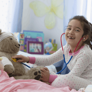 Featured Image for Little girl examining teddy