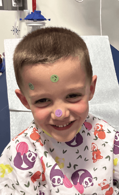 More Childhood Please Magazine - Boy with stickers on f