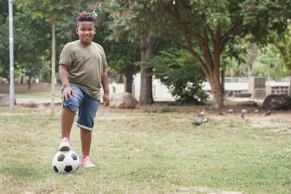 GettyImages-Black slightly overweight boy soccer