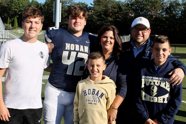 Bryce Sisak football player with his family