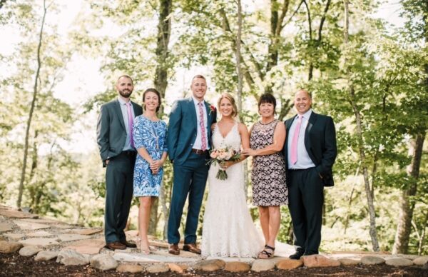 Ashley and Dan Hess with her family on their wedding day