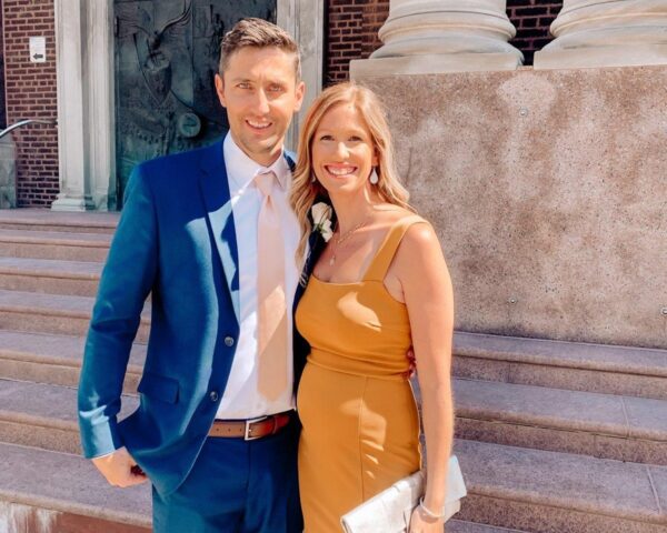 Dr Kelsey Brocker and husband Brad outside a church