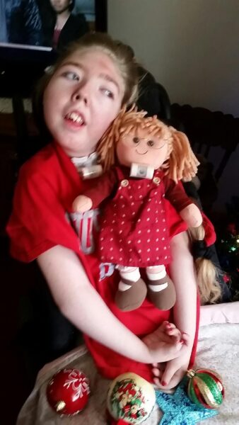 Marissa Anderegg with her doll