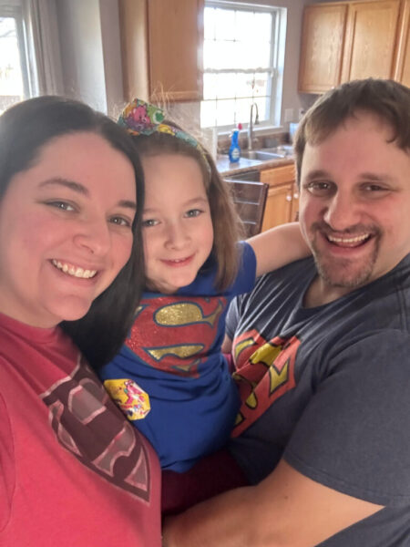 Darcy Evins with her husband Nate and daughter McKenzie