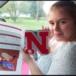 Gabby Conrow shows high school book