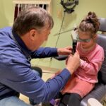 Dr. Richard Hertle, director of pediatric ophthalmology, set to retire from Akron Children's Dr Hertle and patient Riley Osburn at her last appointment
