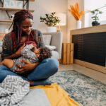 Mother breastfeeding a baby