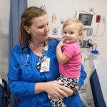 Elaina Gross with her nurse Molly Duda