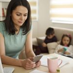 Getty Images - mom on smartphone