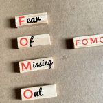 FOMO in kids: How to spot it and help your child cope FOMO acronym word.
