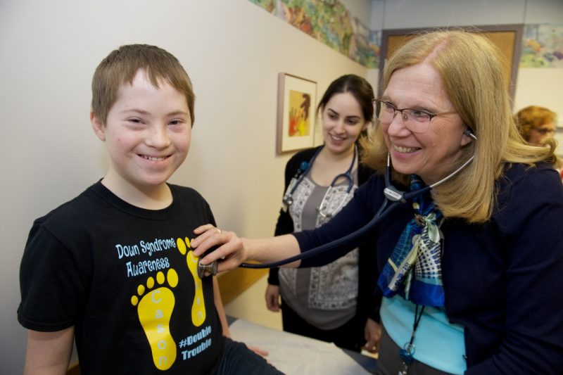 Dr. Langkamp with a patient