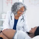 What is an MFM specialist? GettyImages-OB with pregnant woman