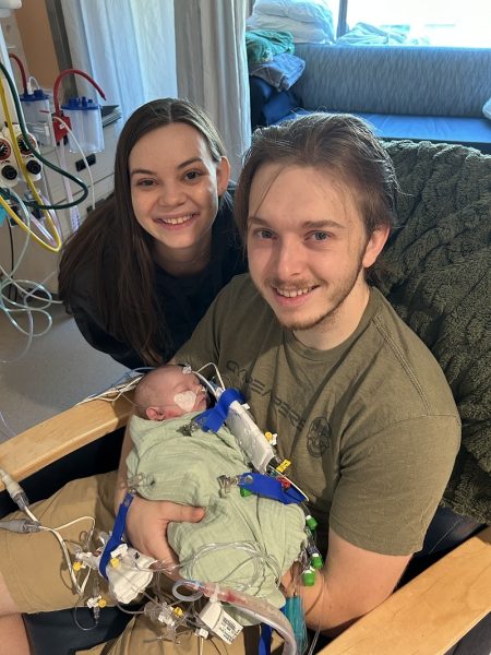 David Campbell in hospital with parents