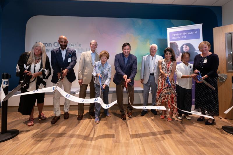 Stakeholders gather to cut the ribbon at the new Akron Children's Behavioral Health inpatient unit.