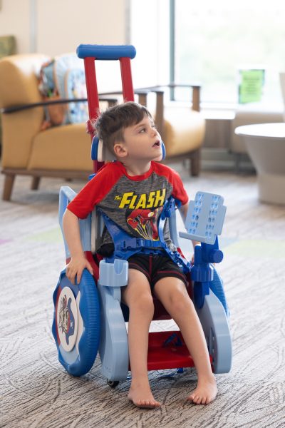 Colt Hiller using his toddler motility trainer (TMT) for the first time.