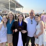 After a kitchen burn, mom sees Akron Children’s in a new light Patient Allison Dennison with her family at a relative's graduation in a football stadium.